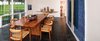 Modern home with Dining Room. Dining room - table by Joyce and Edgar Anderson, chairs by Hans Wegner, textile wall art by Mariette Rousseau-Vermette Photo 4 of The Grotta House