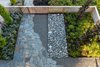 Modern home with Outdoor, Walkways, Wood Fences, Wall, and Front Yard. A view of the entry garden from above. Photo 5 of Magnolia Modern