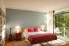 Modern home with Bedroom, Shelves, Table Lighting, Night Stands, Bed, and Bookcase. The master bedroom, with a modern Case Study bed and vintage Atollo table lamps.
Photo 10 of Los Feliz Residence