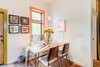 Modern home with Living Room. Another angle of the dining nook at The Sursy #WeeHouse.
Meet The Makers:
.PILLOWS / Olive & Olde's (Denver, CO)
.TABLE / Protea & Pine (Denver, CO)
.CHAIRS / Onefortythree (Henderson, NV)
.NEON ART / Scott Young (Denver, CO)
.'FACES' COLLECTION / WCB Designs (Nashville, TN) Photo 15 of The Sursy WeeHouse