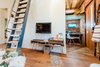 Modern home with Office, Desk, Lamps, Study Room Type, Medium Hardwood Floor, and Shelves. The front entrance to The #WeeHouse: a shoppable airbnb concept in Denver, CO designed and managed by The Sursy.
Meet The Makers:
.LADDER / Design: ShelterBelt Design + Artist / Welder: Bonnie Gregory (Denver, CO)
CONSOLE / Protea & Pine (Denver, CO)
.RUGS / Sapere Collection (Boulder, CO)
.DESK / Atla Designs (Boulder, CO)
.NEON SIGN / Scott Young (Denver, CO)
.PRINTS / Springer The Artist (Jackson Hole, WY)
.PILLOWS / Olive & Olde's (Denver, CO)
.FLORALS / Flora by Nora (Denver, CO) Photo of The Sursy WeeHouse