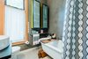 Modern home with Bath Room, Soaking Tub, Freestanding Tub, Pedestal Sink, and Drop In Sink. Quaint bathroom with a clawfoot tub at The Sursy #WeeHouse.
Meet The Makers:
.ARCHITECT / Nicole Delmage, ShelterBelt Designs (Denver, CO)
.SHOWER CURTAIN / Tressa Lavinia Linzy Designs (Fernandina Beach, FL)
.WALNUT BATH TRAY / Protea & Pine (Denver, CO)
.CANDLE / North + 29 Candle Co (Castle Rock, CO)
.ROCKY MOUNTAIN MIRROR / soft co. (Philadelphia, PA)
.PAPER PRODUCTS / Who Gives A Crap (Melbourne, Victoria)
.MUDCLOTH COASTERS / Reflektion Design (Los Angeles, CA) Photo 8 of The Sursy WeeHouse