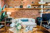 Modern home with Living Room, Accent Lighting, Gas Burning Fireplace, Chair, Lamps, Sofa, Shelves, Medium Hardwood Floor, Table Lighting, and Coffee Tables. COFFEE TABLES / Atla Designs (Boulder, CO)
FLORALS / Flora by Nora (Denver, CO)
CANDLE / North + 29 Candle Co (Castle Rock, CO)
'THE IZAPA' ARM CHAIRS / Masaya & Co (Nashville, TN)
'THE MELROSE' SOFA / Clad Home (Los Angeles, CA)
'THE MAGGIE' PILLOW / Olive & Olde's (Denver, CO)
'THE BLOOMINGTON' LAMP / Fenway Clayworks (Denver, CO) Photo 11 of The Sursy Lincoln Park