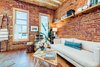 Modern home with Living Room, Table Lighting, Accent Lighting, Coffee Tables, Sofa, Bookcase, Chair, and Wall Lighting. A view towards the front of the #WeeHouse.
Meet The Makers:
.BOUCHEROUITE STOOL / The Boho Lab
.COFFEE TABLES / Atla Design (Boulder, CO)
.FLORALS / Flora by Nora (Denver, CO)
.CHAIR / Masaya & Co. (Nashville, TN)
.SOFA / Clad Home (Los Angeles, CA)
.PILLOW / Olive & Olde's (Denver, CO)
.LAMP / Fenway Clayworks (Denver, CO)
.TELLURIDE PRINT / Springer The Artist (Jackson Hole, WY) Photo 17 of The Sursy WeeHouse