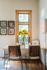Modern home with Medium Hardwood Floor, Chair, Accent Lighting, and Wall Lighting. Intimate + quirky dining nook in The Sursy #WeeHouse! Everything is shoppable.
Meet The Makers:
.'THE CARSON' SIDE CHAIRS / Onefortythree (Henderson, NV)
.'THE SURSY' TABLE / Protea & Pine (Denver, CO)
.'NOT DONE YET' NEON ART / Scott Young (Denver, CO)
.PILLOWS / Olive & Olde's (Denver, CO)
.'FACES' COLLECTION / WCB Designs (Nashville, TN) Photo 12 of The Sursy WeeHouse