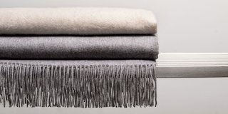 These cashmere throws, among the new offerings from Ben Soleimani, are available in three designs.