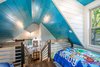 sleeping loft looking out Photo 17 of Mountain Bikers Tiny House Getaway modern home