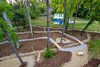Modern home with Outdoor, Back Yard, and Walkways. bike track view from the balcony Photo 19 of Mountain Bikers Tiny House Getaway