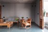 Modern home with Living Room, Chair, Sofa, End Tables, Ceiling Lighting, Coffee Tables, and Wall Lighting. Living area Photo 2 of Jungalow
