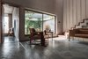 Modern home with Living Room, Table, Coffee Tables, Chair, and Ceiling Lighting. Family room Photo 15 of Jungalow