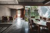 Modern home with Dining Room, Chair, Ceiling Lighting, and Table. View of entry and courtyard from dining area Photo 3 of Jungalow