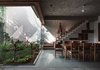 Modern home with Staircase, Cable Railing, Wood Tread, and Concrete Tread. Connection of dining and courtyard Photo 11 of Jungalow