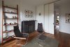 Modern home with Office, Medium Hardwood Floor, Chair, Shelves, and Study Room Type. THIRD FLOOR - GUEST ROOM & FAMILY ROOM
Photo © Ashok Sinha Photo 9 of Bed-Stuy Townhouse