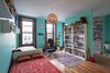 Modern home with Bedroom, Pendant Lighting, Ceiling Lighting, Bed, Shelves, Chair, Wall Lighting, Wardrobe, Bookcase, and Medium Hardwood Floor. SECOND FLOOR - KIDS’ BEDROOM
Photo © Ashok Sinha Photo 8 of Bed-Stuy Townhouse