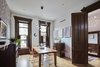 Modern home with Dining Room, Recessed Lighting, Chair, Ceiling Lighting, Wood Burning Fireplace, Pendant Lighting, Table, Bar, Storage, and Light Hardwood Floor. PARLOR FLOOR - DINING ROOM & MAIN ENTRY
Photo © Ashok Sinha Photo 4 of Bed-Stuy Townhouse