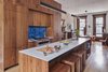 Modern home with Kitchen, Microwave, Light Hardwood Floor, Undermount Sink, Range, Recessed Lighting, Glass Tile Backsplashe, Refrigerator, Range Hood, Dishwasher, Pendant Lighting, and Wood Cabinet. PARLOR FLOOR - KITCHEN LOOKING TOWARDS DINING ROOM
Photo © Ashok Sinha Photo 3 of Bed-Stuy Townhouse