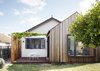 Modern home with Exterior, House Building Type, Metal Roof Material, Tile Roof Material, Gable RoofLine, and Wood Siding Material. Extension Photo of Coburg House