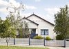 Modern home with Exterior, Gable RoofLine, Tile Roof Material, and House Building Type. Front facade Photo 11 of Coburg House