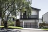 Modern home with Exterior, Metal Roof Material, Gable RoofLine, Wood Siding Material, House Building Type, and Metal Siding Material. Front facade Photo of Yeronga House
