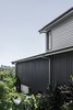 Modern home with Exterior, House Building Type, Wood Siding Material, Metal Roof Material, Gable RoofLine, and Metal Siding Material. Side elevation Photo 2 of Yeronga House