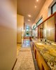 Modern home with Bath Room, Ceiling Lighting, Drop In Sink, Marble Counter, and Enclosed Shower. Master Bathroom Photo 7 of Shifting Shores