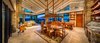 Kitchen, wet bar, living room with 26' wide bifold door system Photo 2 of Shifting Shores modern home