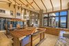 Modern home with Marble Counter, Ceiling Lighting, and Drop In Sink. Kitchen Photo 11 of Shifting Shores