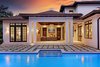 Modern home with Exterior, Stucco Siding Material, House Building Type, and Gable RoofLine. Outdoor living room Photo of Spice Bay