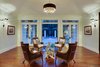 Modern home with Living Room, Accent Lighting, Dark Hardwood Floor, Chair, Pendant Lighting, Ceiling Lighting, and Coffee Tables. Sitting room looking out over pool Photo 5 of Spice Bay