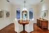Modern home with Dining Room, Ceiling Lighting, Table, Chair, Storage, Pendant Lighting, and Dark Hardwood Floor. Dining Room Photo 6 of Spice Bay