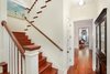 Modern home with Staircase, Wood Railing, and Wood Tread. Staircase and hallway with built in cabinetry Photo 10 of Spice Bay
