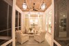 Modern home with Living Room, Coffee Tables, Chair, Pendant Lighting, Accent Lighting, and Ceiling Lighting. Screened in Porch Photo 12 of Venice Beach Cottage
