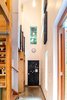 Modern home with Hallway and Concrete Floor. Polished concrete floors with raised concrete base board for easy cleaning. Photo 12 of Guemes Island Home