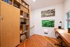 Modern home with Storage, Chair, and Shelves. Office space with built-in wood desk for two. Photo 20 of Guemes Island Home