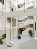 The public space surrounded by the main three-dimensional dynamic lines of the original building Photo 20 of THE VILLAGE modern home