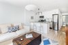 Modern home with Kitchen and Light Hardwood Floor. The 2-bedroom garden rental apartment features a washer / dryer in the unit with a modern kitchen. Photo 15 of A Bedford-Stuyvesant home that celebrates lifestyle