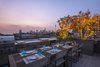 Modern home with Outdoor, Trees, and Rooftop. A phenomenal 1,100 sq ft of outdoor space offers the perfect setting for entertaining and taking in views of the Manhattan skyline. Photo of A Brooklyn Penthouse With Three Terraces