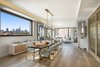 Modern home with Dining Room, Table, Chair, Light Hardwood Floor, and Ceiling Lighting. The sprawling sun-bathed residence boasts nearly 2,800 sq ft of luxury living space. Photo 2 of A Brooklyn Penthouse With Three Terraces