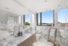 Modern home with Bath Room, Soaking Tub, and Marble Counter. The spa-like master en-suite is marble-clad with a relaxing soaking tub. Photo 6 of A Brooklyn Penthouse With Three Terraces