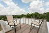 Modern home with Outdoor. The roof deck offers mile of hill country views. Photo 10 of Off Grid Cabin in the Texas Hill Country