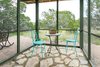 The screened in gazebo is the perfect bug free place to have a meal. Photo 12 of Off Grid Cabin in the Texas Hill Country modern home