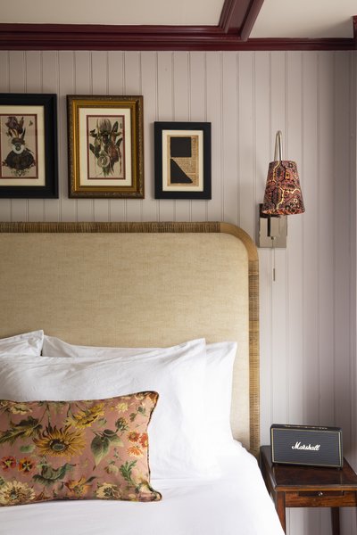 Native flora features heavily in the design, like the modern interpretations of 19th-century botanical drawings found in the guest rooms. The artwork on the far right is made with poetry from a colonial-era journal that the in-house design team found at  the local public library.