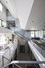 Modern home with Hallway. Light-filled atrium connecting all communal spaces Photo 4 of Cascading House