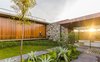 Modern home with Outdoor, Trees, Back Yard, Large Patio, Porch, Deck, and Gardens. The house has a 10.000L cistern in order to water the gardens and the green roof and also has the generation capacity of 5.372 kW/year, equivalent to approximately 420kW/month. Photo 15 of Patio House