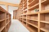 Modern home with Office, Bookcase, Shelves, Library Room Type, Desk, and Carpet Floor. Library Photo of Mocking Bird