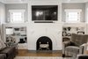Modern home with Living Room, Chair, Standard Layout Fireplace, Sectional, and Bookcase. Fireplace Photo 2 of Secret Garden
