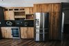 Modern home with Kitchen. Custom Cabinets Photo of FLW Fan