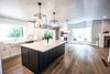 Modern home with Kitchen, Wood Cabinet, Wine Cooler, Subway Tile Backsplashe, Engineered Quartz Counter, Beverage Center, Dishwasher, Pendant Lighting, Colorful Cabinet, Ceiling Lighting, and White Cabinet. Kitchen Photo 10 of Limoncello