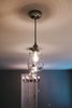 Modern home with Kitchen. Pottery Barn Pendants Photo 12 of Gray Matters Kitchen