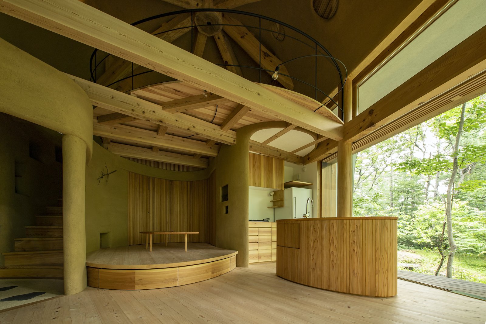 Photo 5 of 24 in This Curvaceous Timber and Earth Cabin Blends Into a